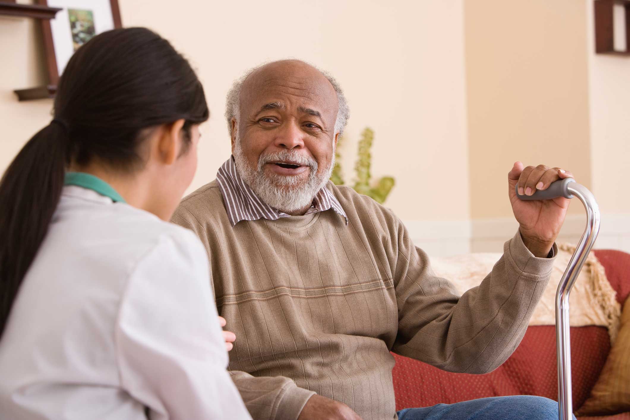 Older man with caregiver.
