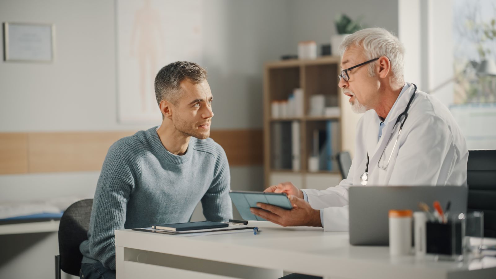 A man talks to his doctor.