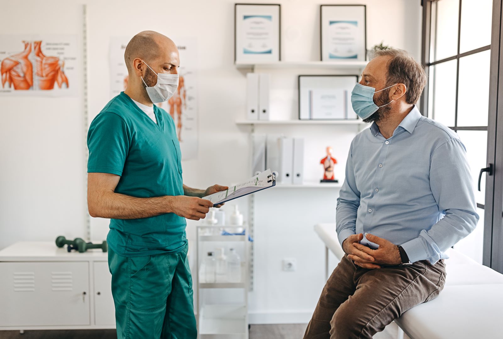 Patient talks to his primary care doctor.