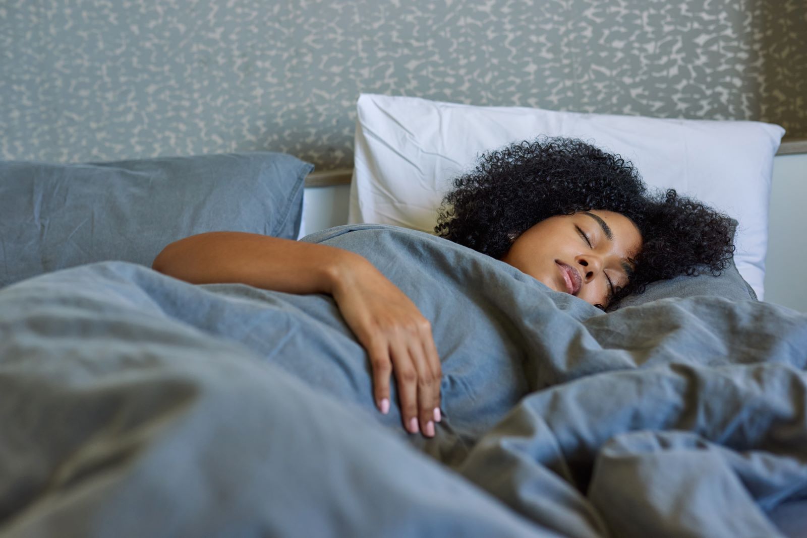 A woman sleeps.