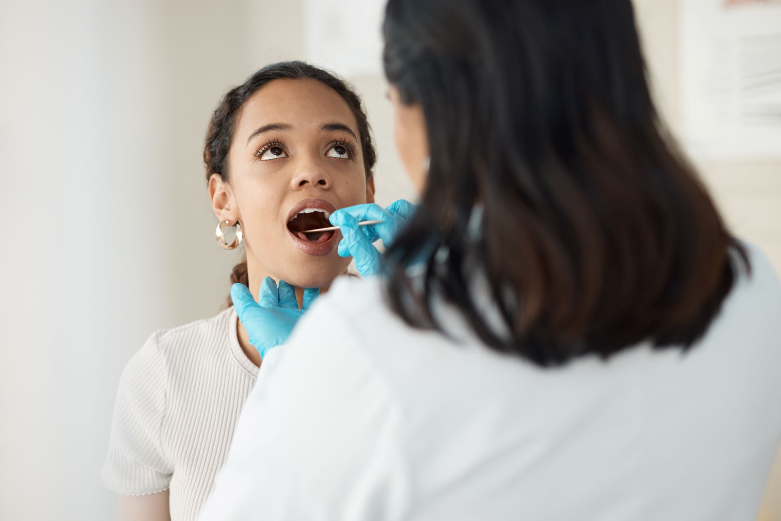 Worried about mouth cancer? Learn these six signs and symptoms to look out for, as well as treatments and causes.