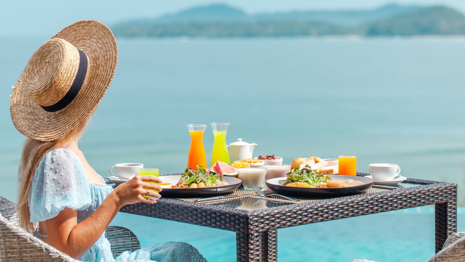 Here's how to stay on track with your diet while enjoying a well deserved vacation, according to a dietitian.