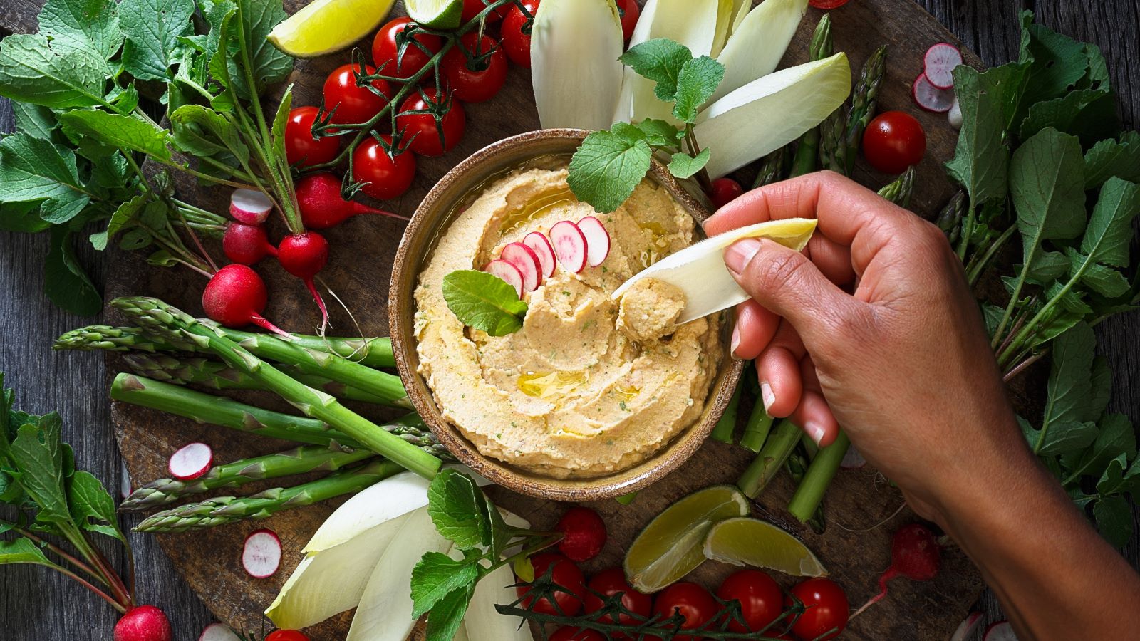Here's what a dietitian has to say about eating before bed, and what foods you should reach for if you're prone to late night snacking.