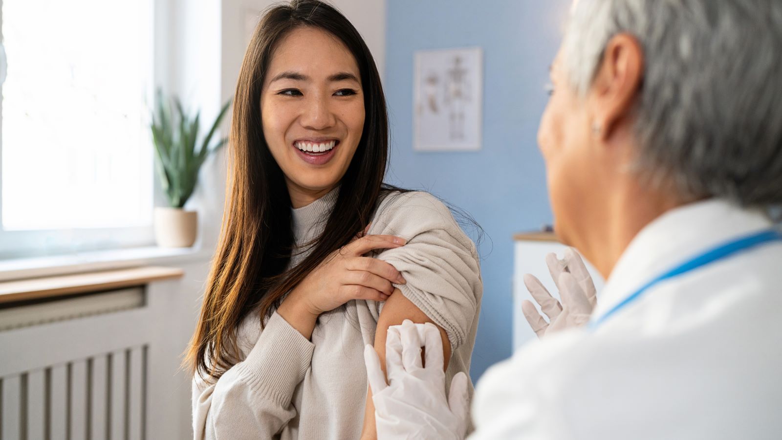 adult woman getting a measles vaccine